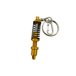 Tuned. Coilover Keyring (GOLD)